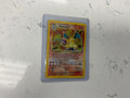 Base set CHARIZARD DAMAGED