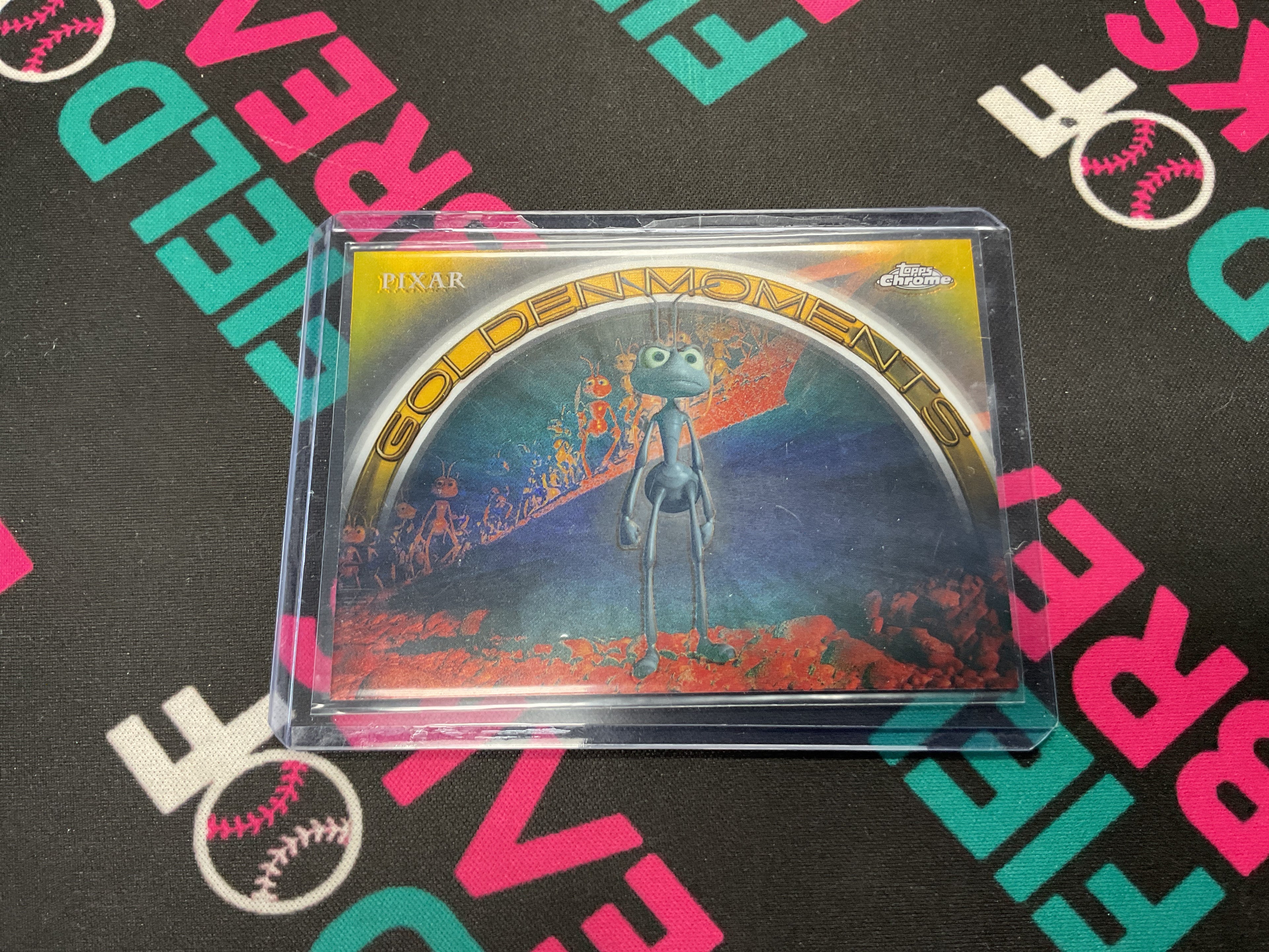 2025 Topps Chrome Pixar Golden Moments Flik Stands Up to Hopper