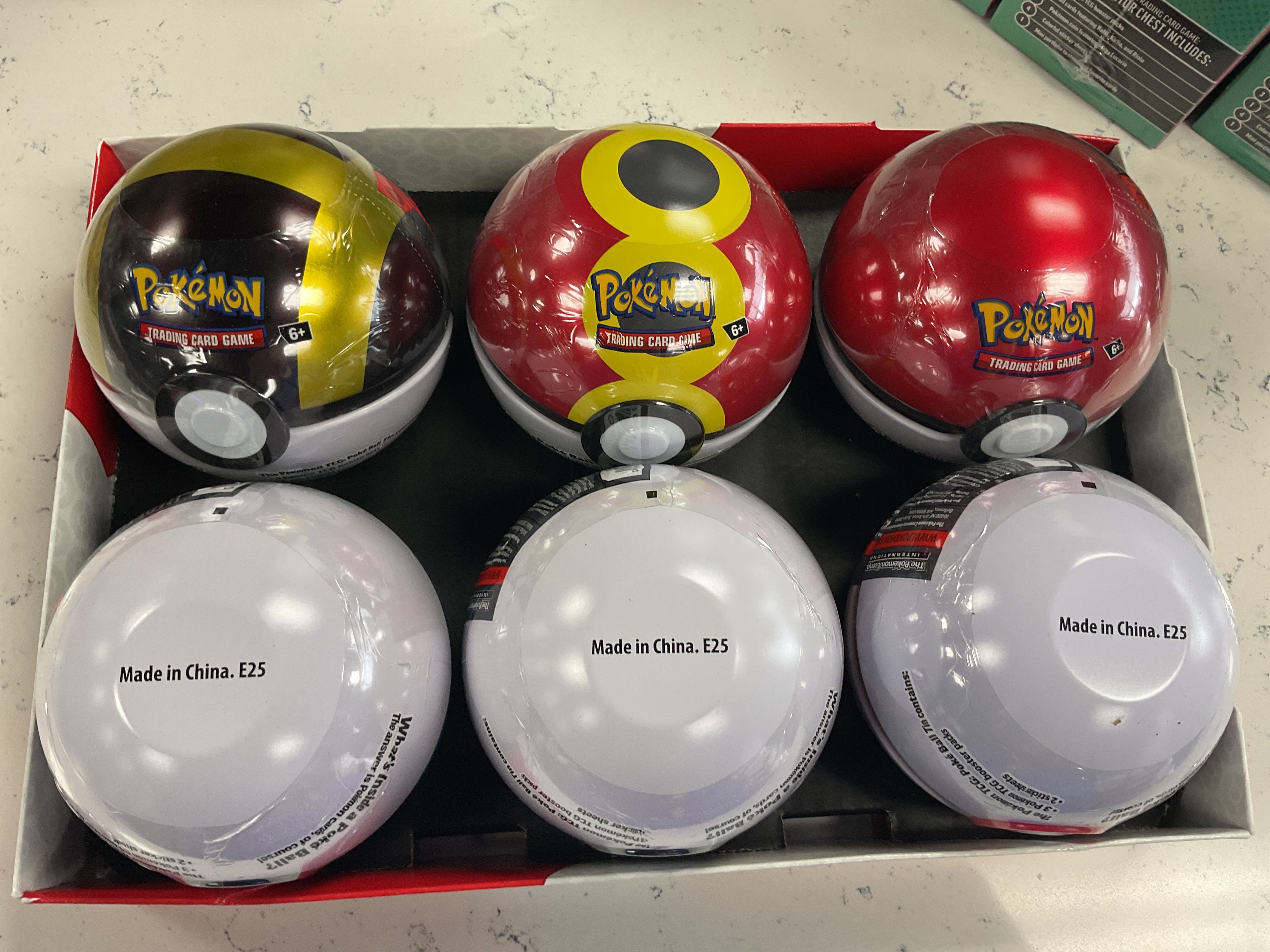 E25 Pokeball tin J&J